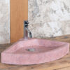 Corner sink in pink travertine