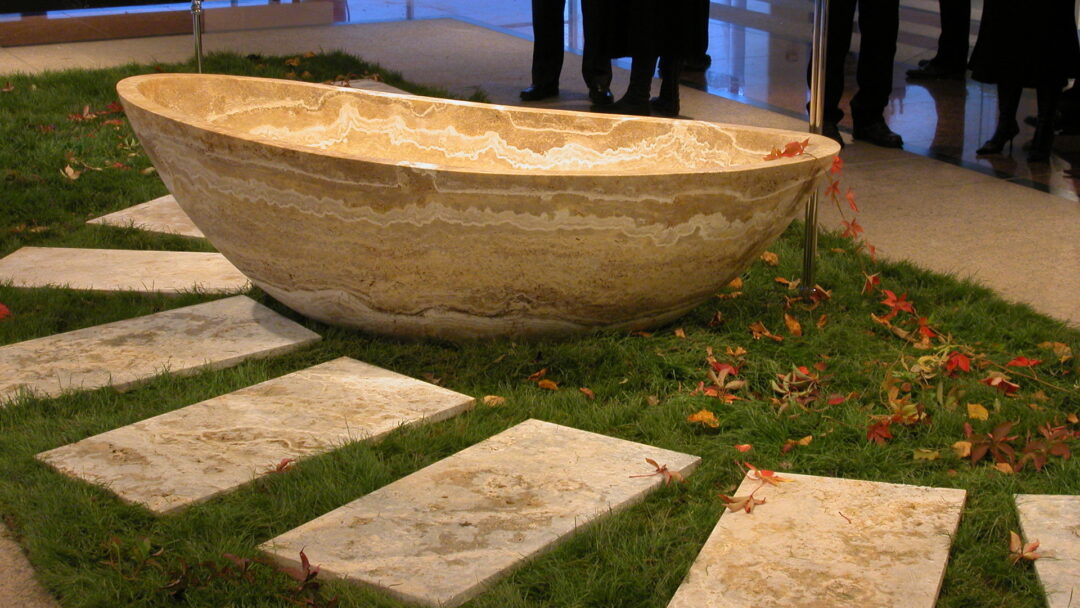 Cradle in solid travertine
