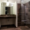 Floor and wall covering in Dark Zebra cross-cut travertine