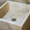 Detail of travertine pedestal sink Pyramid