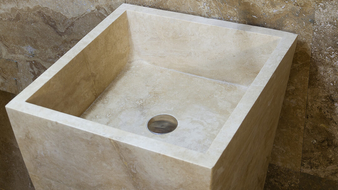 Detail of travertine pedestal sink Pyramid
