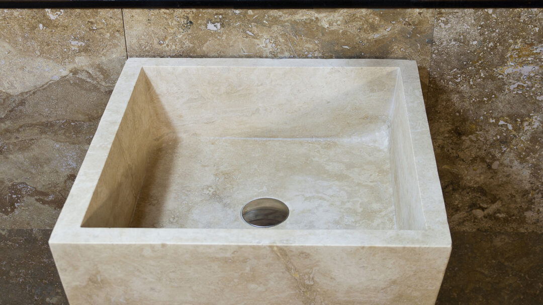 Detail of travertine pedestal sink model Pyramid
