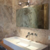 Tuscan travertine bathroom cladding from Rapolano