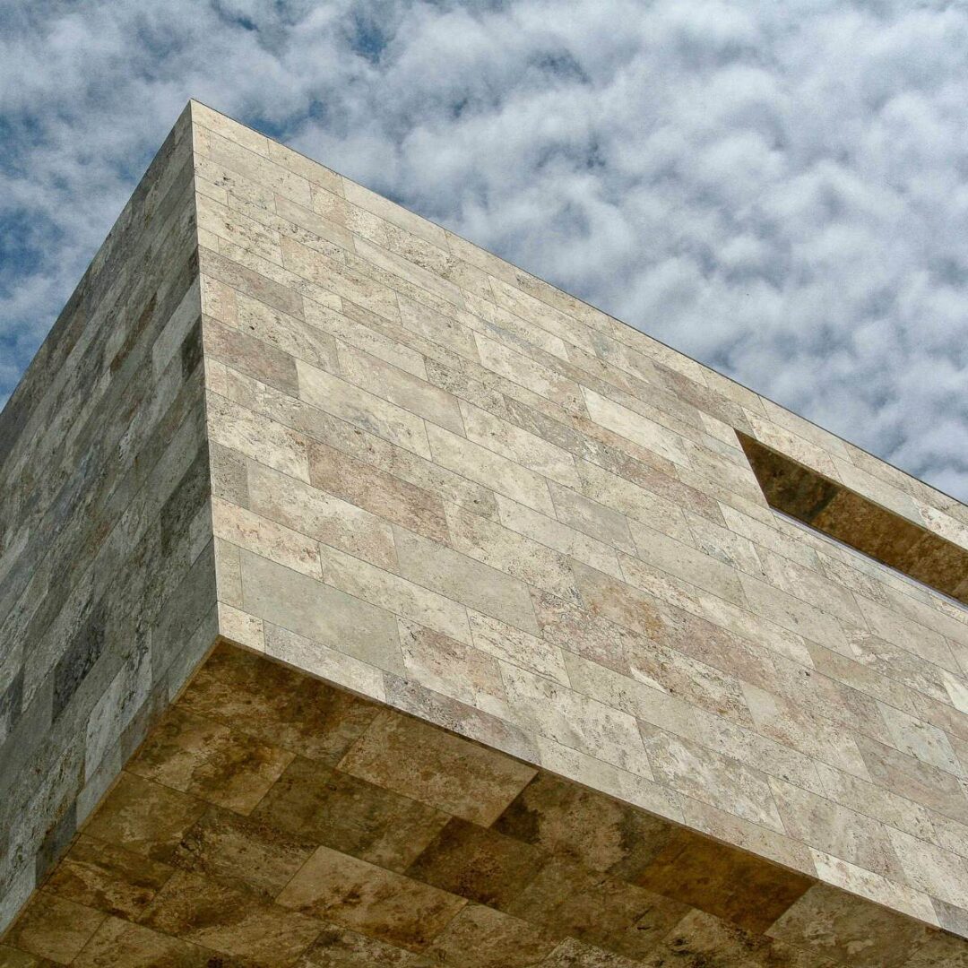 Ventilated facade cladding in Light Earth travertine - Rapolano Stones