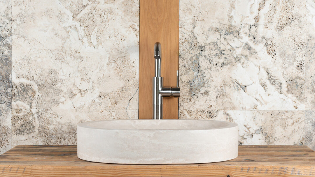 Lavabo in travertino ovale modello Soap