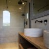 Crosscut travertine modern bathroom