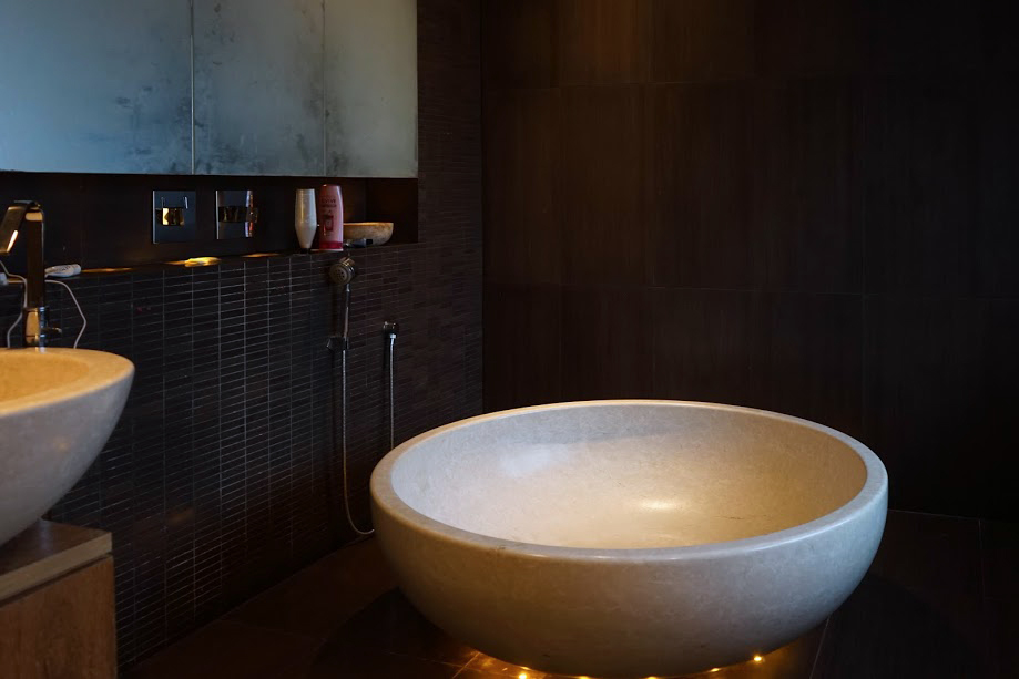 Bathroom with light travertine tub copy