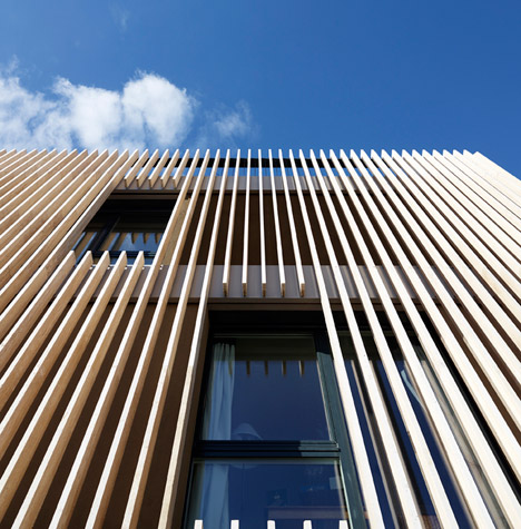 Group asia architecture travertine cladding striped living travertine facade