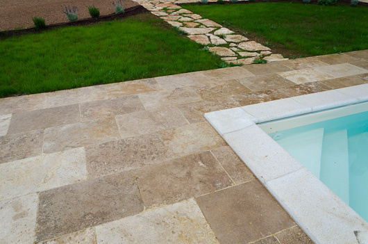 Pool with travertine flooring